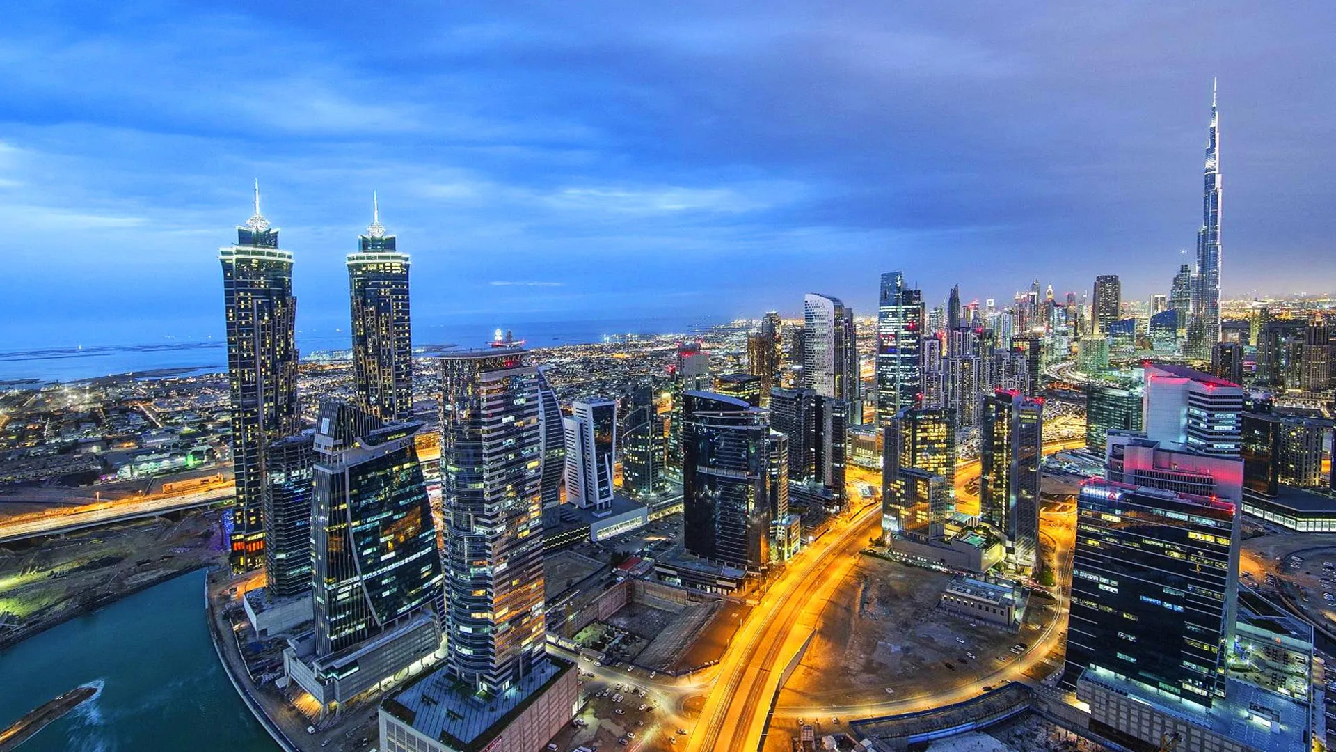 Hotels in Business Bay Dubai along Sheikh Zayed Road with Dubai Canal waterfront in background