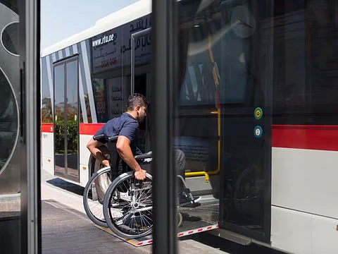 Dubai Bus on Demand minibus with wheelchair ramp showing the accessibility features of RTA's Bus on Demand service in Dubai for passengers with mobility needs