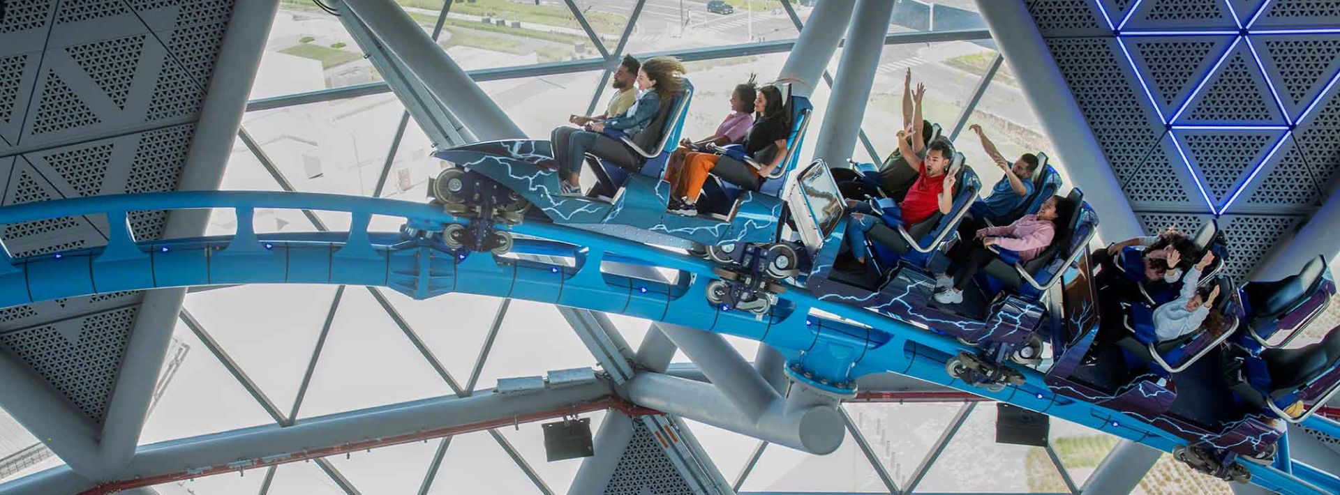 Dubai Hills Mall interior showing retail shops, dining outlets and entertainment including the Storm Coaster indoor rollercoaster serving Dubai Hills Estate residents
