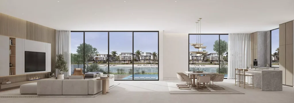 dining and living area in a villa at Lakeshore at The Sanctuary in MBR city by Ellington Properties