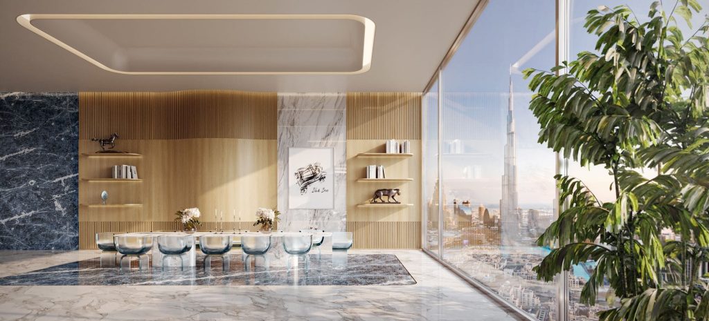 dining room that has burg khalifa view at Bugatti Residences by Binghatti in Business Bay Dubai