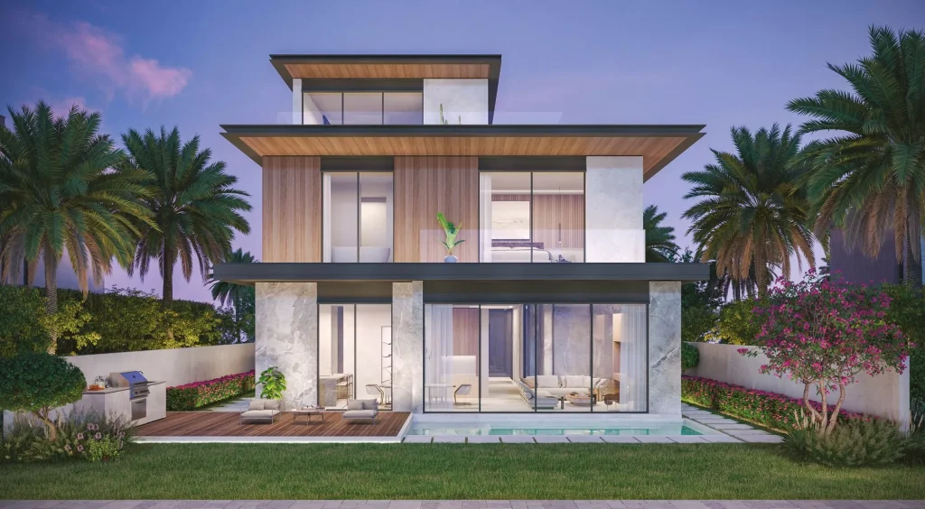 night exterior view of a villa at Lakeshore at The Sanctuary in MBR city by Ellington Properties